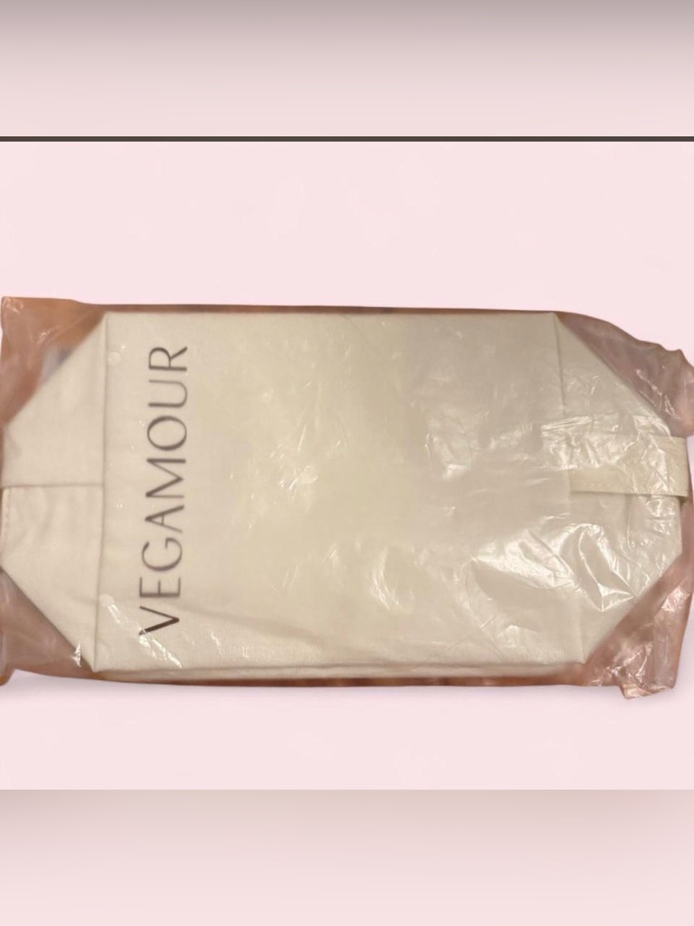 Vegamour beige cosmetic pouch. New unopened!